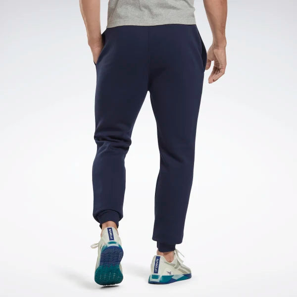 TROUSERS MAN REEBOK TROUSERS WORKOUT PANT KNIT BLUE