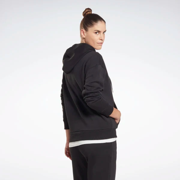 Tuta nera reebok sales